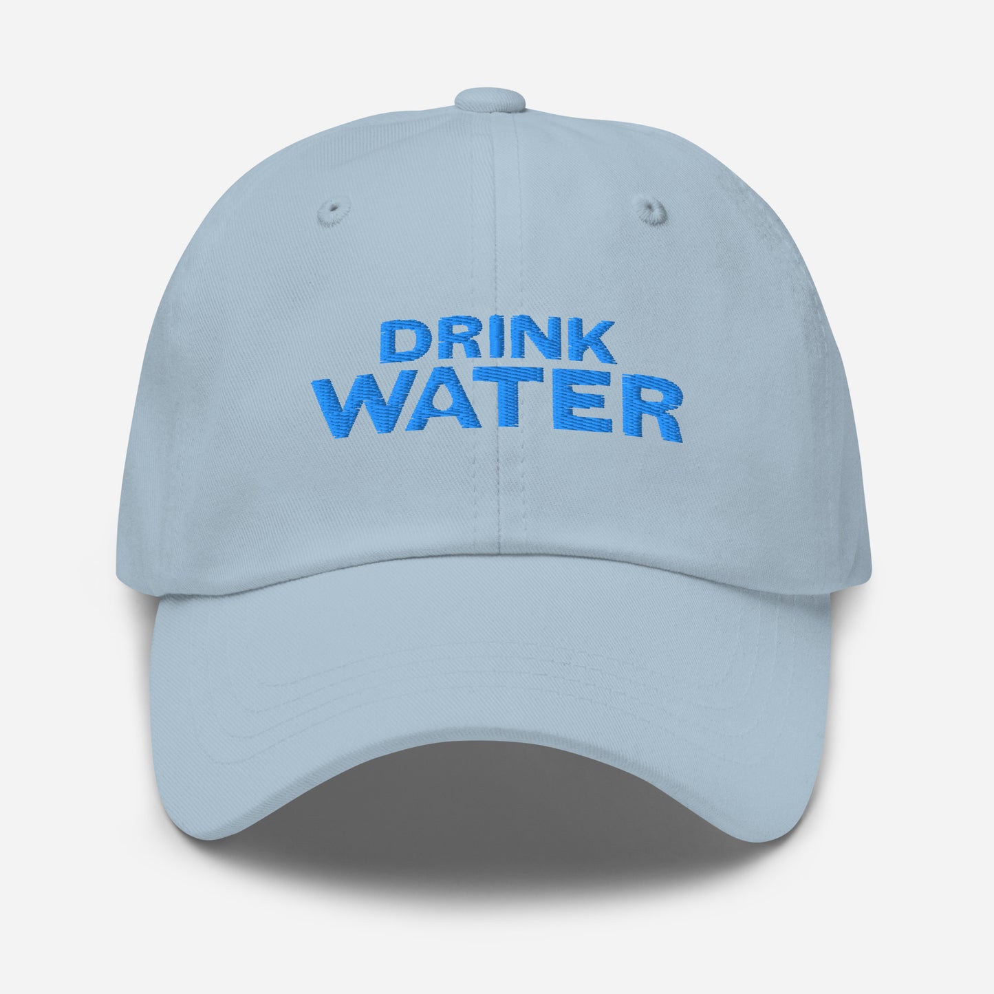 Light blue classic dad hat with bright blue text that reads ‘DRINK WATER’ designed by queer creators to express the need to remember to stay hydrated. Front view, not on model.