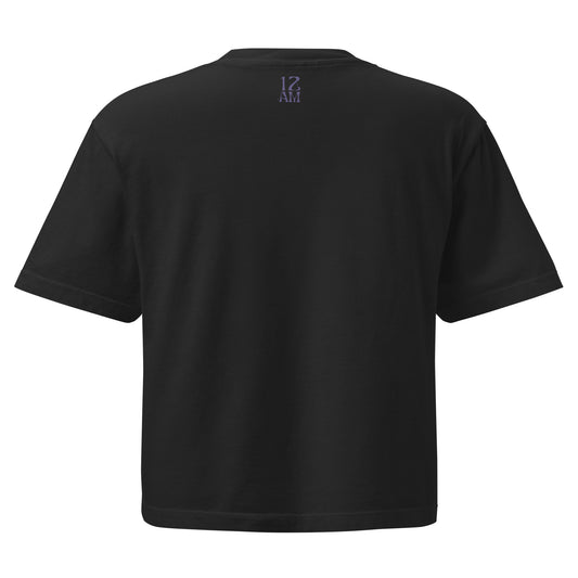 Black, boxy T-shirt featuring the phrase 'Gender Freedom’ over the American flag honoring the First Amendment and the patriotic right to express identity, speak truth, and live freely in the land of liberty. Designed by a small LGBTQ+ owned business. Back of shirt