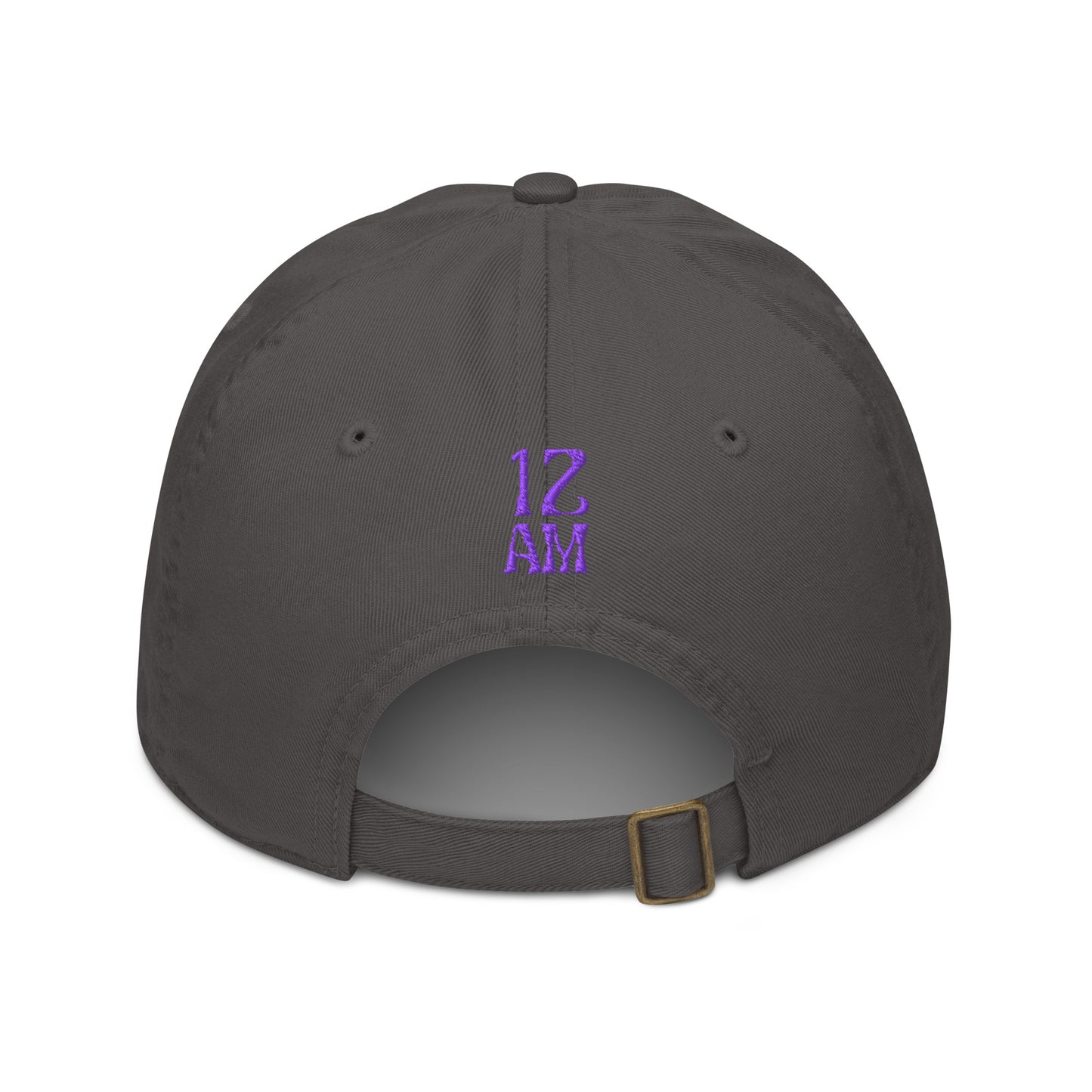 Charcoal dad hat embroidered with the word "Trying." in spaced serif lettering — a 12:AM Intuition design honoring the messy middle. Back of hat with 12AM logo.