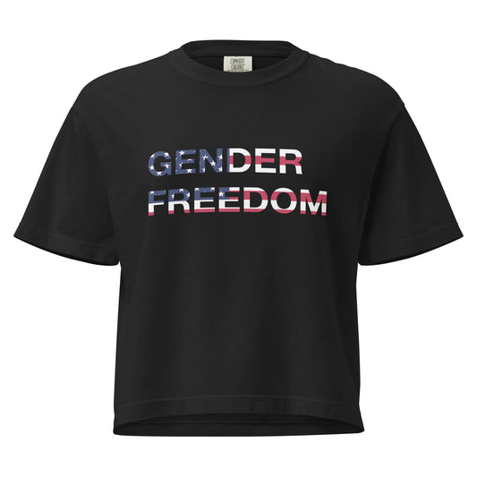 Black, boxy T-shirt featuring the phrase 'Gender Freedom’ over the American flag honoring the First Amendment and the patriotic right to express identity, speak truth, and live freely in the land of liberty. Designed by a small LGBTQ+ owned business. Front of shirt