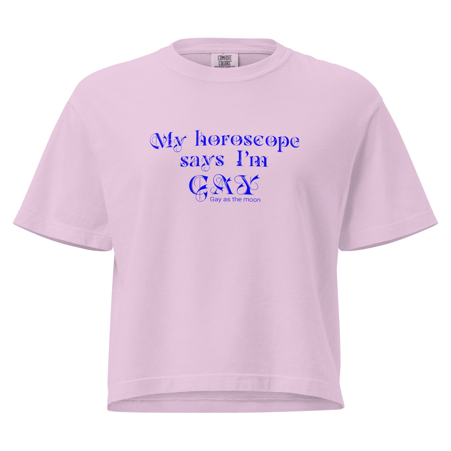 Orchid, boxy t-shirt featuring the phrase ‘My horoscope says I’m gay’ in a blue decorative typeface, gay as the moon. Playful nod to queer identity and astrology, embracing the idea that astrology is gay. Designed by a small LGBTQ+ owned business. Front of shirt.