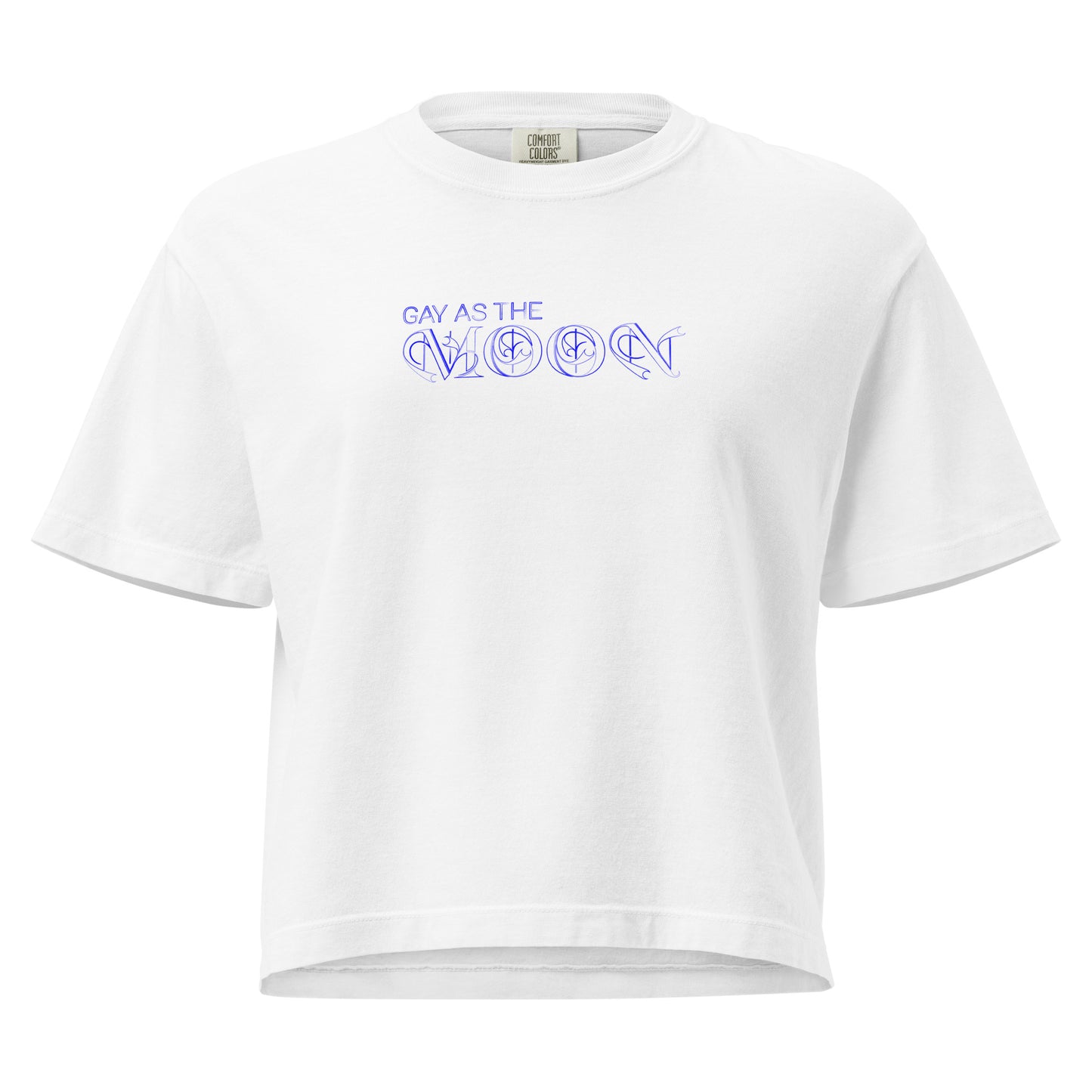 White, boxy T-shirt featuring the phrase ‘Gay as the moon’ in a decorative blue typeface. Playful nod to queer identity and astrology, embracing the idea that astrology is gay. Designed by a small LGBTQ+ owned business. Front of t-shirt. 