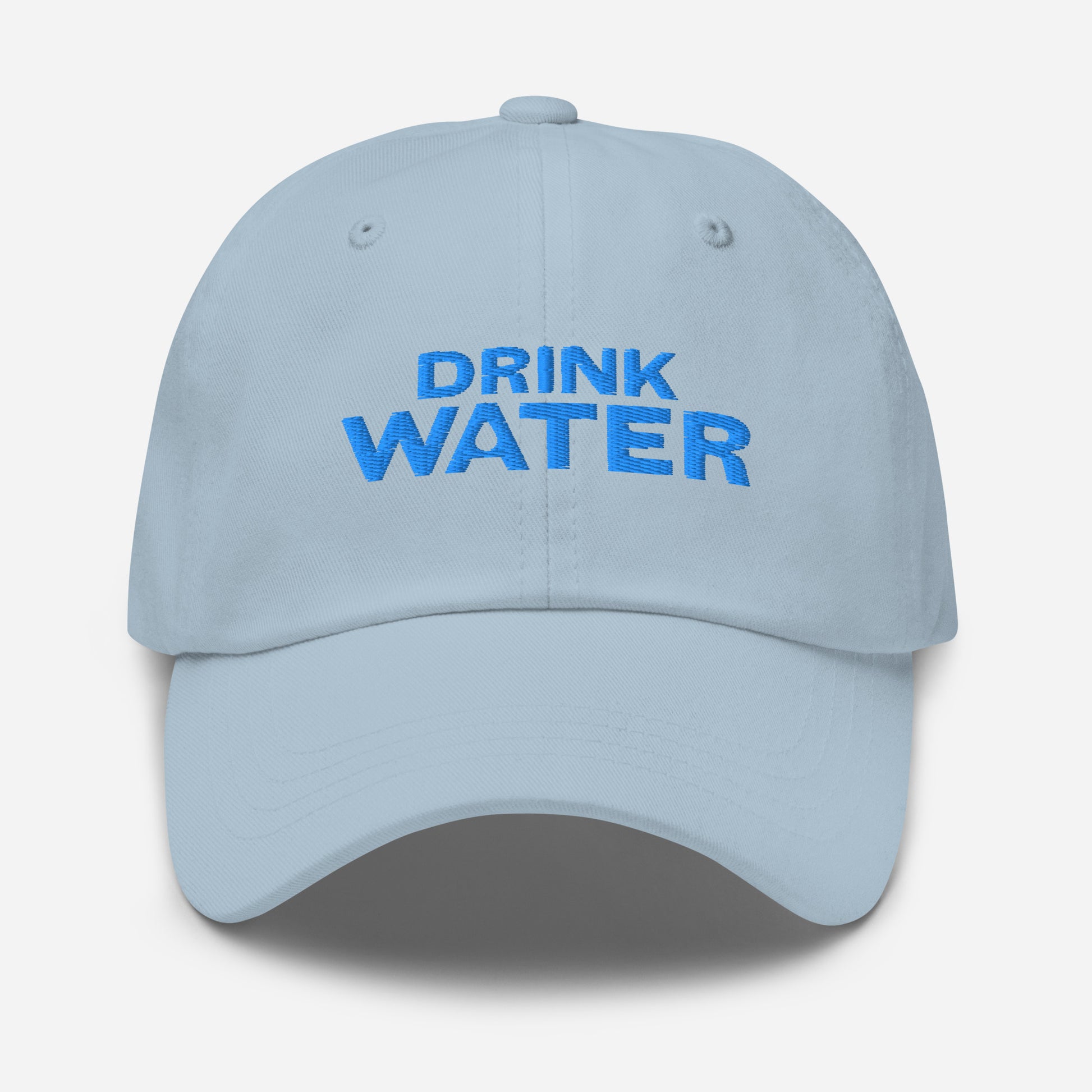 Light blue, classic dad hat with bright blue text that reads ‘DRINK WATER’ designed by queer creators to express the need to remember to stay hydrated. Designed by a small LGBTQ+ owned business. Front of hat.