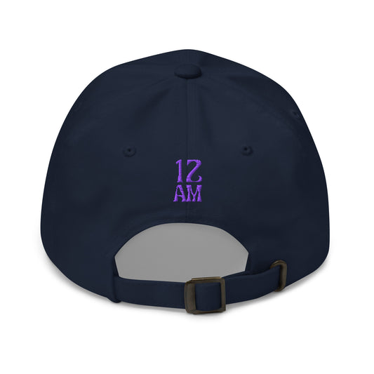 Navy Blue, classic dad hat featuring the phrase 'Gay as the moon' in a white decorative typeface. Playful nod to queer identity and astrology, embracing the idea that the moon is gay. Designed by a small LGBTQ+ owned business. Back of hat.