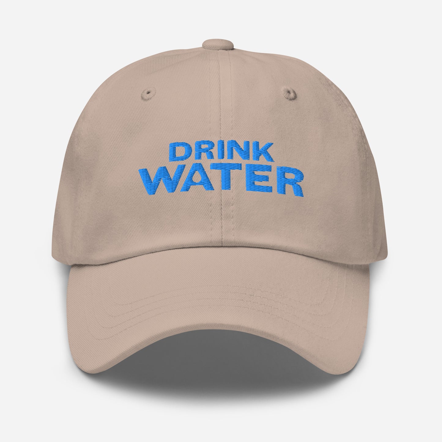 Stone, classic dad hat with bright blue text that reads ‘DRINK WATER’ designed by queer creators to express the need to remember to stay hydrated. Designed by a small LGBTQ+ owned business. Front of hat.