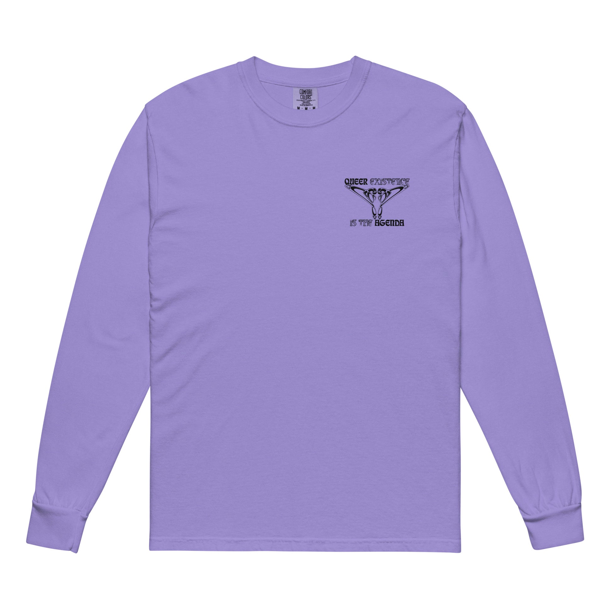 Violet, long-sleeve shirt. Featuring the phrase ‘Queer existence is the agenda’ on the front, ‘here to stay’ on the back. Design is in black, with a butterfly design on the front and an abstract design on the back. Design is in contrast to legislation that is based on eraser of queer people. Designed by a small LGBTQ+ owned business. Front of shirt. 