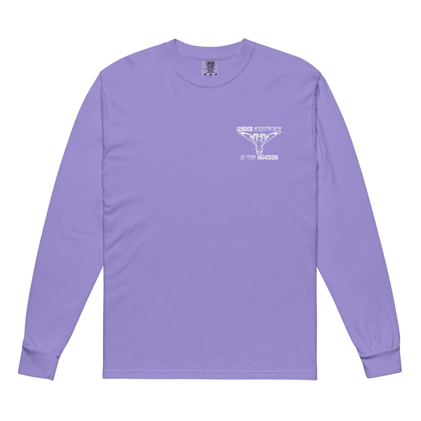Violet, long-sleeve shirt. Featuring the phrase ‘Queer existence is the agenda’ on the front, ‘here to stay’ on the back. Design is in white, with a butterfly design on the front and an abstract design on the back. Design is in contrast to legislation that is based on eraser of queer people. Designed by a small LGBTQ+ owned business. Front of shirt. 