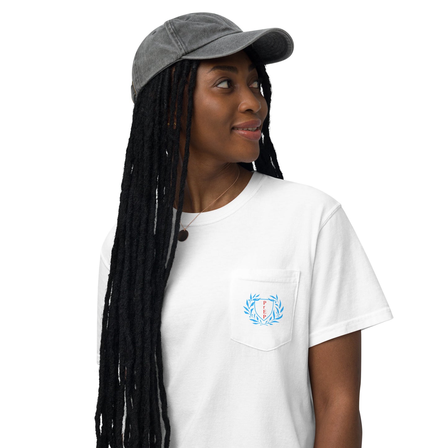 White t-shirt with a pocket and bold front text reading ‘PrEP’ styled in Ivy League-inspired design. Back says "No one should die from lack of access or ignorance." Made by queer creators to promote HIV awareness and access to PrEP through unapologetic activism and education. Front view, on model.