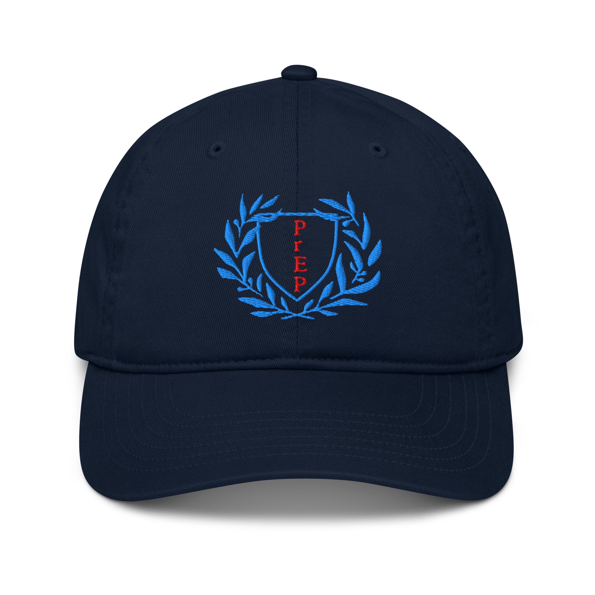 Navy colored hat, front text reading ‘PrEP’ in red, blue leaves styled in Ivy League-inspired design. Made by queer creators to promote HIV awareness and access to PrEP through unapologetic activism and education. Side view, not on model.