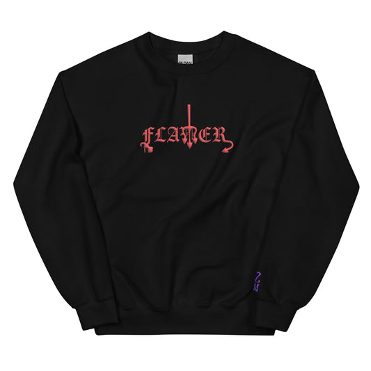 Black, sweatshirt featuring the word ‘Flamer’ in a bold, illustrative typeface. Reclaiming the phrase “flaming gay,” this design leans into a devil-mascot aesthetic to celebrate every queer who refuses to dim their fire. Designed by a small LGBTQ+ owned business. Front of sweatshirt.