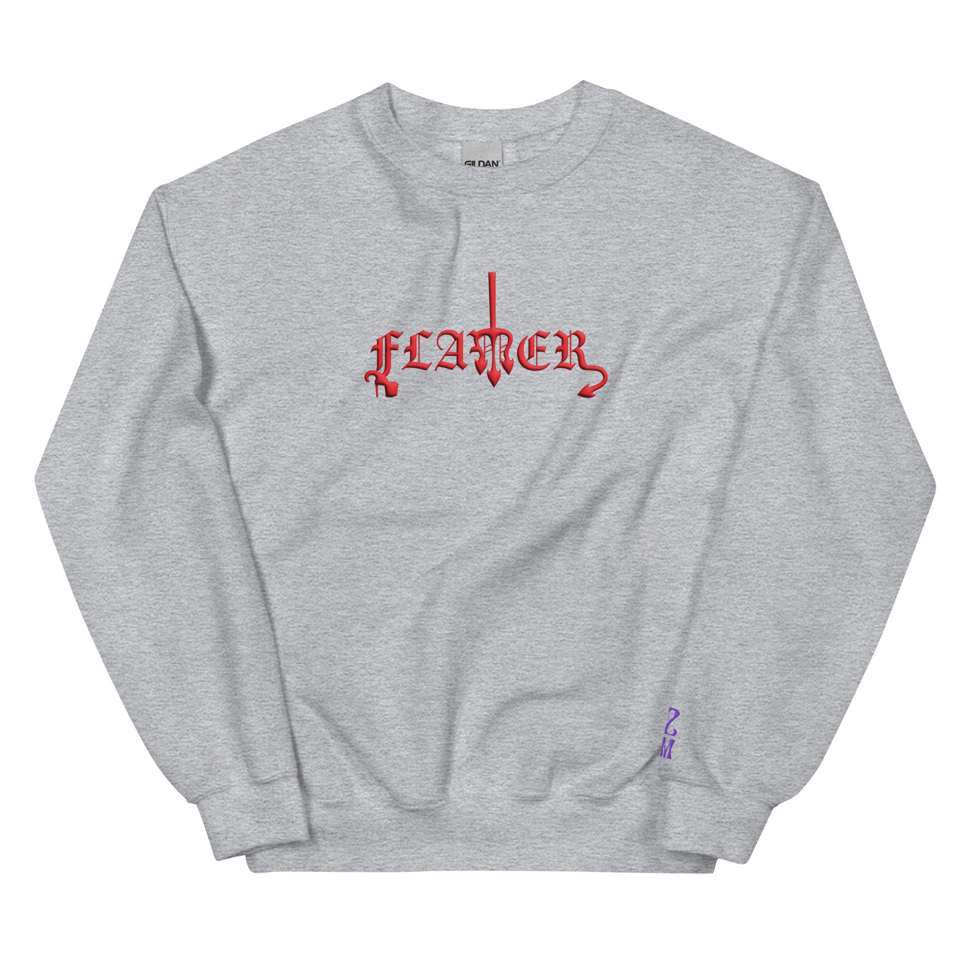 Sport Grey, sweatshirt featuring the word ‘Flamer’ in a bold, illustrative typeface. Reclaiming the phrase “flaming gay,” this design leans into a devil-mascot aesthetic to celebrate every queer who refuses to dim their fire. Designed by a small LGBTQ+ owned business. Front of sweatshirt.